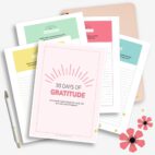 printable gratitude journal pages on notebook with pen