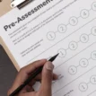Printable pre-assessment core values worksheet being filled in by hand with a pen.