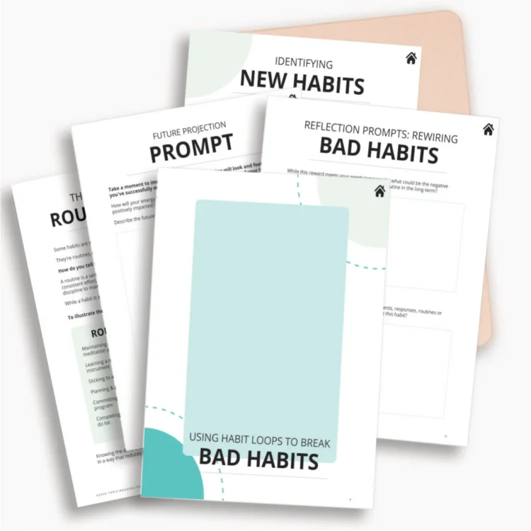 flatlay printable habit tracker journal workbook PDF pages on top of notebook